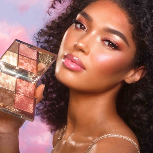 Glowgasm Face Palette Lovegasm on deep skin tone model Glowgasm Face Palette Lovegasm on deep skin tone model