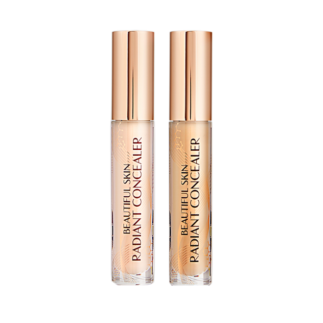 Beautiful Skin concealer duo bundle closed Two radiant concealers in glass tubes with gold-coloured lids, and text on the tubes that reads, 'Beautiful Skin Concealer'