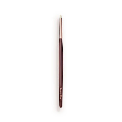 Synthetic Eyeliner Brush A slim eyeshadow brush with white-coloured bristles with a rose-gold and dark crimson handle.