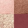 Luxury Palette in Fire Rose swatches Swatches of a quad eyeshadow palette in rose gold, dark brown, champagne gold, and dark maroon.