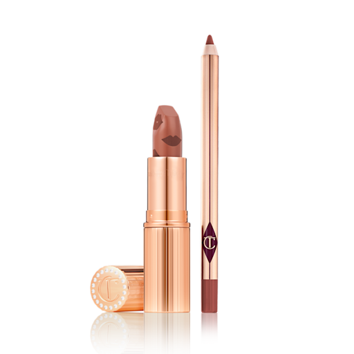 Island Dream Lip Kit open An open nude terracotta lipstick in golden-coloured packaging with a lip liner pencil in a nude red-terracotta shade.