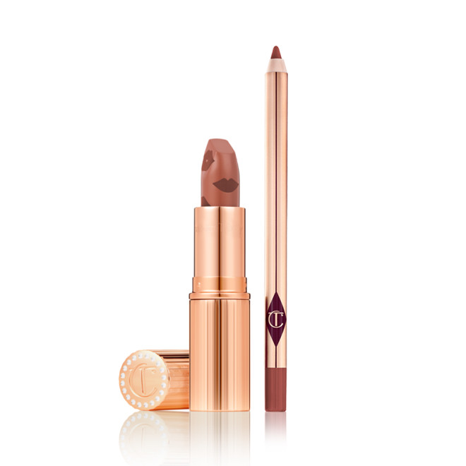An open nude terracotta lipstick in golden-coloured packaging with a lip liner pencil in a nude red-terracotta shade.