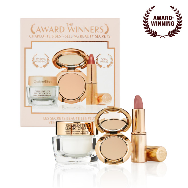 Pearly-white face cream in a glass jar with a gold-coloured lid, pressed powder compact in a medium-shade, and a dusky pink lipstick in a sleek gold-coloured tube.