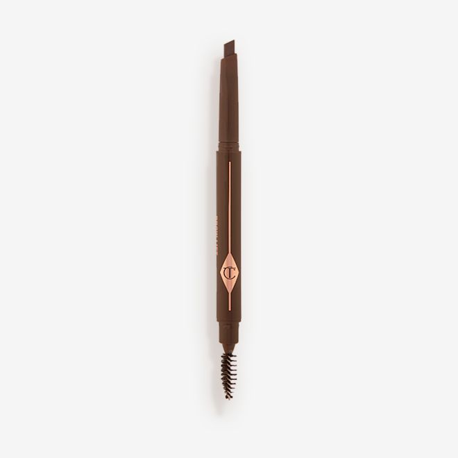 Brow Lift in Dark Brown open An open, double-ended eyebrow pencil and spoolie brush duo in a dark brown shade with dark-brown-coloured packaging