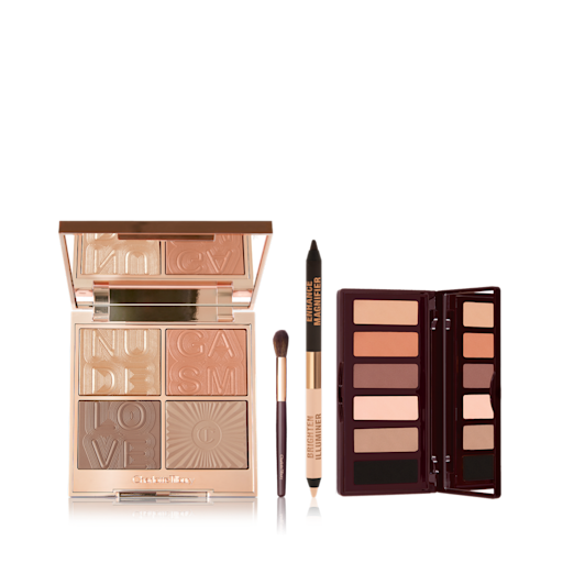 The SuperNudes look Kit open An open double-ended eyeliner pencil in black and nude beige shades, an open, mirrored-lid six-pan eyeshadow palette with matte eyeshadows in brown, peach, and beige shades, and an open face palette with a mirrored lid with a reflective fawn eyeshadow that can be used as a highlighter, dark brown-peach blush, and a contour and eyeshadow duo in brown shades.