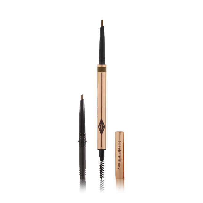 A double-ended eyebrow pencil and spoolie brush duo in a soft brown shade with gold-coloured packaging and the refill besides it.