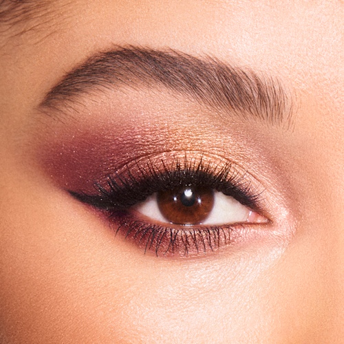 Plum Eyeshadow Look Model eye close up wearing a plum eyeshadow makeup look using The Vintage Vamp Luxury Palette