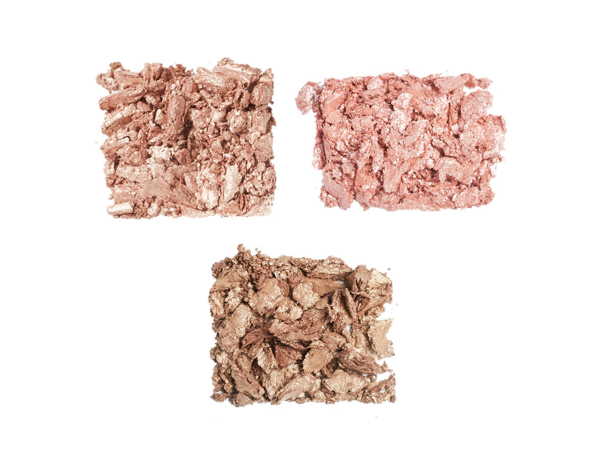 Hollywood Flawless Eye Filters Prime shade swatches Swatches of three shimmery priming eyeshadows in dusky pink, dark champagne, and brown-gold.