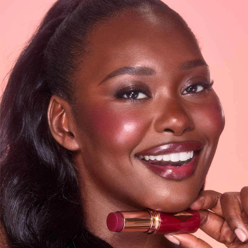 Raspberry Blush Model wears Berry Glow for a raspberry blush look