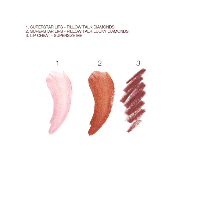 Swatches of two shimmery lipsticks in sheer pink and nude coppery-bronze colour and swatch of a lip liner pencil in a brownish-maroon colour.