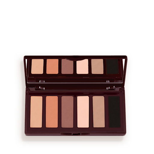 Super Nudes Easy Eye Palette, geöffnet An open, mirrored-lid six-pan eyeshadow palette with matte eyeshadows in brown, peach, and beige shades.
