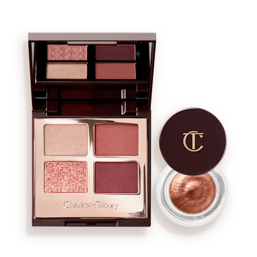 Eyes to Mesmerise and Luxury Palette Kit open An open, mirrored-lid quad eyeshadow palette with beige, rose gold, russet brown, and maroon shades and cream eyeshadow in a nude pink shade in a petite, open pot with its lid removed.