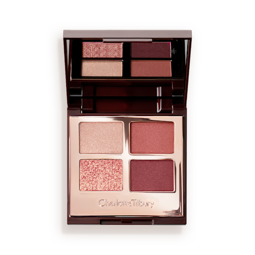 Luxury Palette Eyeshadow in Walk of No Shame open An open, mirrored-lid eyeshadow palette in shades of rose gold, champagne, maroon, and redwood.