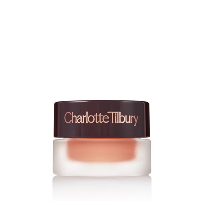 A golden pink duo-chrome-effect cream eyeshadow with a duo-chrome metallic finish in a petite glass pot with a dark brown lid.
