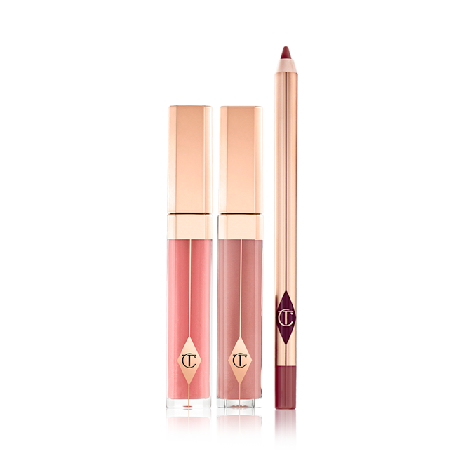 Pout Perfection Lip Kit displayed Tow lip glosses in gold-coloured packaging in a nude pink and mauve shades with a lip liner pencil in a maroon shade.