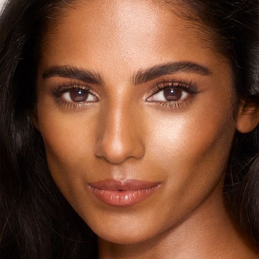 UNREAL SKIN SHEER GLOW TINT - 9 TAN UNREAL SKIN SHEER GLOW TINT - 9 TAN