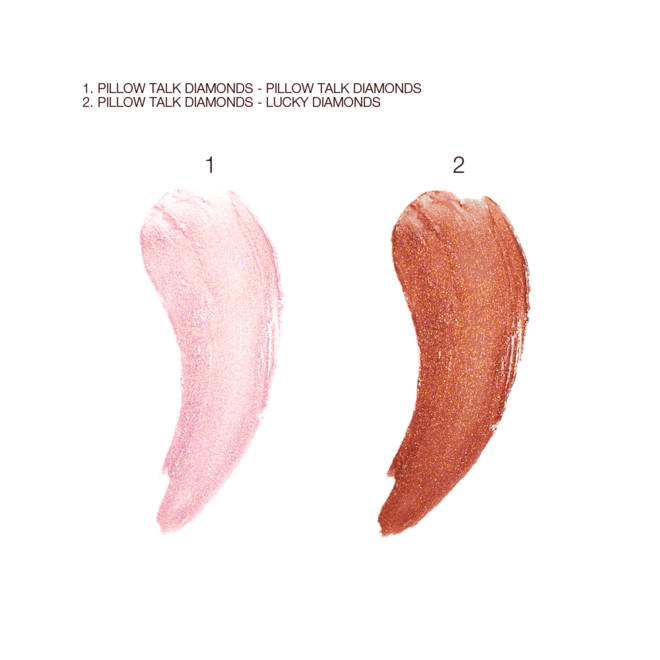 Pillow Talk Diamonds and Lucky Diamonds lipstick Swatches Swatches of two sheer, glittering lipsticks in rose-pink and bronze coral-pink.