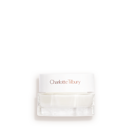 Mini Magic Water Cream Closed Mini clear jar with a white lid and white cream inside.