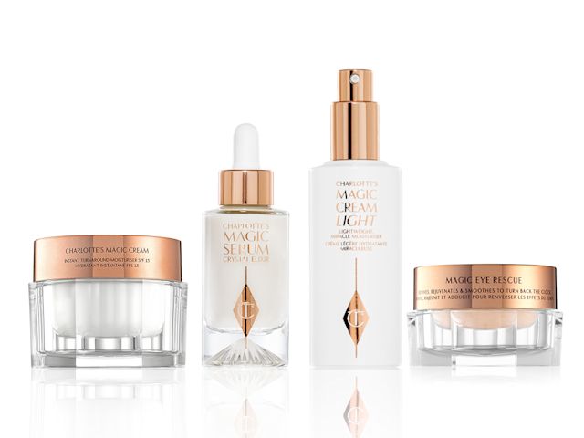 Magic Cream, Magic Cream Light , Magic Serum Crystal Elixir, and Magic Eye Rescue Pearly-white face cream in a glass jar, luminous face serum in a glass bottle with a dropper lid, light face cream in a glass bottle, and eye cream in a glass pot, all having gold-coloured lids.