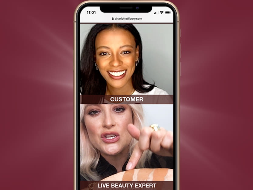 Virtual consultation online foundation banner A plum-coloured banner with a mobile phone with a makeup artist showing how to apply foundation on video call to a customer, and finding your right shade.