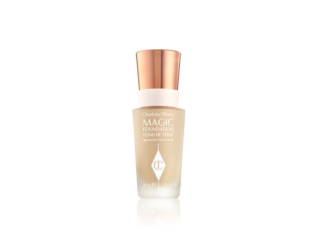 Magic Foundation still life A light beige-coloured foundation in a frosted glass bottle with the CT logo printed on it and a rose gold coloured lid.
