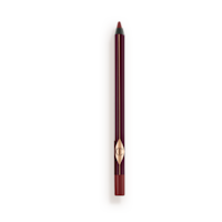 Pillow Talk Eyeliner pencil a berry-brown eyeliner pencil with its cap removed.