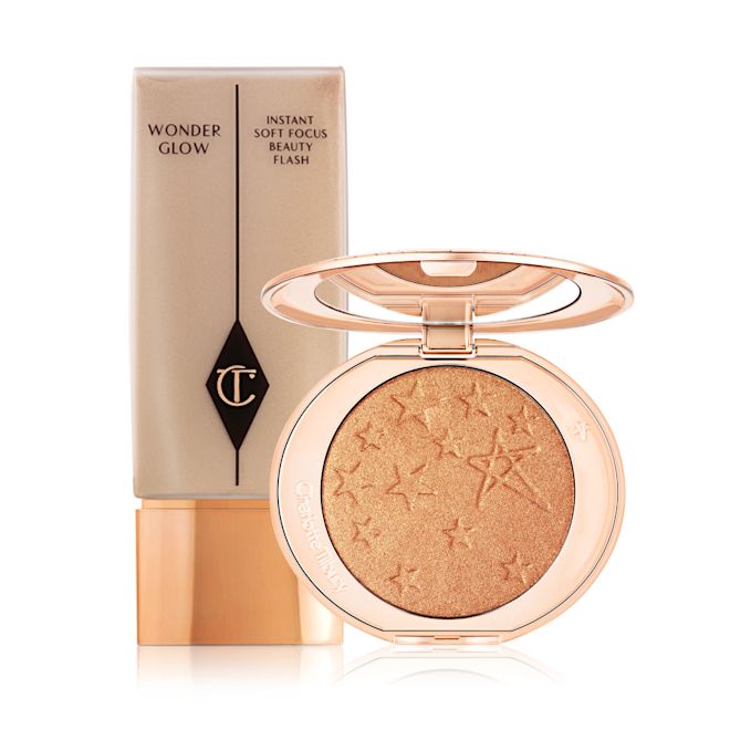 Wonderglow and Hollywood Glow Glide Highlighter Glowy primer in rose gold packaging, plus a copper-gold powder highlighter with a mirrored lid.