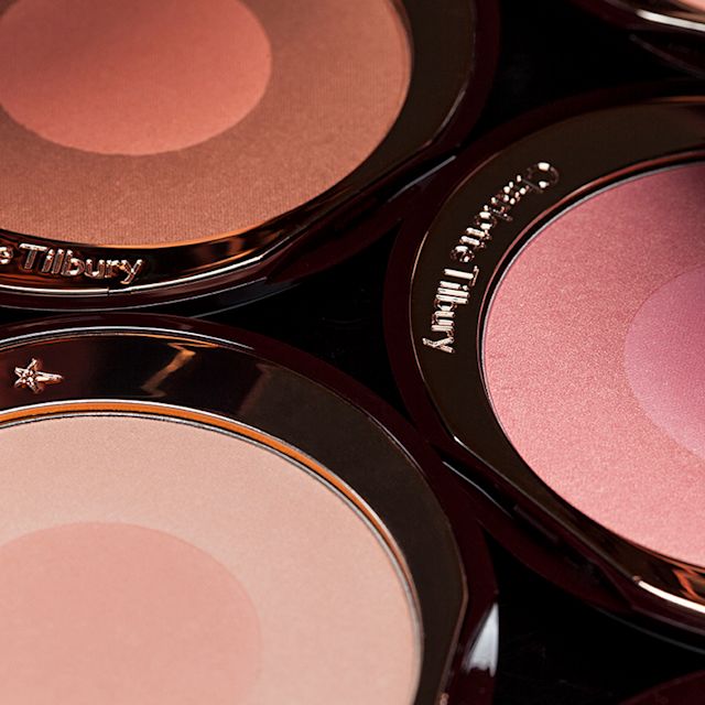 Cheek to Chic Blushes open Open, two-tone powder blushes in shades of light, warm, and dark pink.