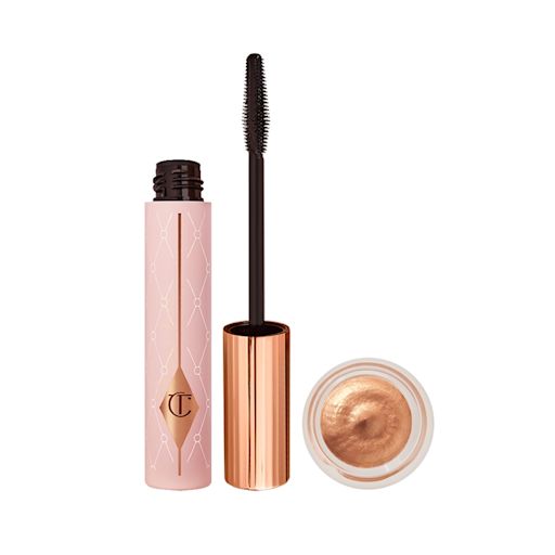 Sun-Kissed Summer Eyes Kit An open, black-coloured mascara in a pink-coloured tube with cream eyeshadow in rose gold shade in a glass pot.