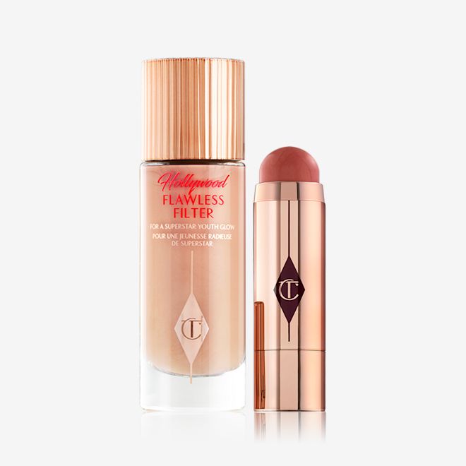 Fresh Glowing Complexion Duo A glow-boosting primer in a light peach colour with an open blush stick in a terracotta colour, both in reflective golden-coloured packaging.