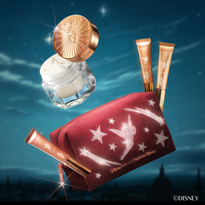 Disney100 x Charlotte Tilbury collection featuring Charlotte's Magic Cream, Beauty Light Wands and Beauty Wishes makeup bag
