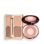 Bronzed Blushing Beauty Kit open An open contouring and bronzing duo in a compact with a mirrored lid with an open, two-tone blush compact in a muted pink shade with a mirrored lid.