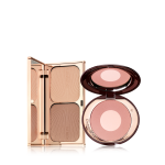 An open contouring and bronzing duo in a compact with a mirrored lid with an open, two-tone blush compact in a muted pink shade with a mirrored lid. 