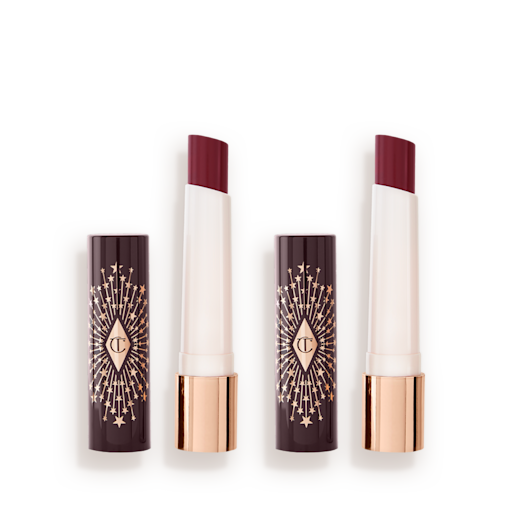 Hyaluronic Happikiss Duo open Two, open, moisturising lipstick lip balms in nude pink and peachy rose shades.