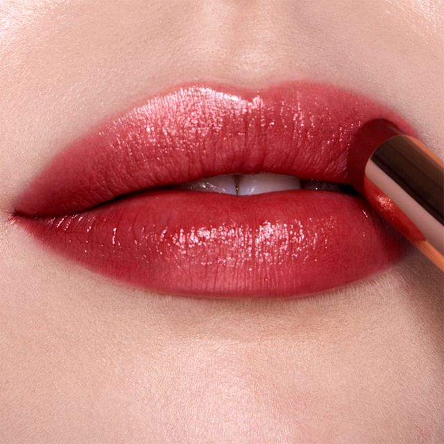 Sparkly Red Lipstick close up Model wearing Superstar Lips sparkly red lipstick