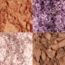 Instant Eye Palette in Bejewelled Eyes to Hypnotise swatches Close-up swatches of four eyeshadows in matte and shimmery shades of peach, purple, rose gold, and brown.