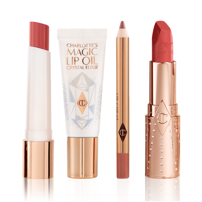 Peachy Pink Lips Kit displayed Glowy, ivory-coloured lip oil in a white-coloured tube, nude pink lip liner, tea pink matte lipstick, coral lipstick balm, and brown-peach lipstick balm.