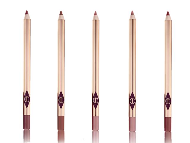 Lip Cheat Lip Liners open A collection of lip liner pencils in shades of pink and brown with golden-coloured packaging.