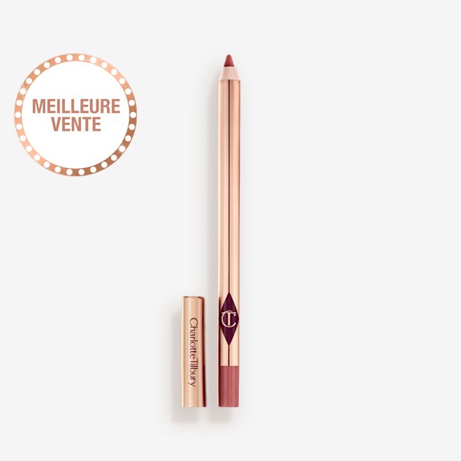 Crayon à lèvres Lip Cheat Pillow Talk 2 Medium sans bouchon Crayon à lèvres rose nude de taille standard sans bouchon et avec un extérieur réfléchissant de couleur dorée.