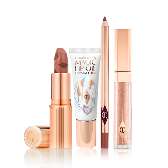 Summer Glowing Lip Wardrobe Lip gloss in a nude golden-brown shade in a glass tube with a gold-coloured lid, open nude peachy-brown lipstick in a gold-coloured tube, lip oil in a white-coloured tube with a reflective, geometrical pattern on the front, and a lip liner in a nude terracotta shade.