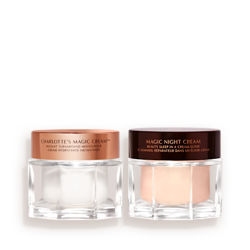 Magic Cream and Magic Night Cream Kit closed Pearly-white face cream in a glass jar with a gold-coloured lid and fawn-coloured night cream in a glass jar with a dark-brown-coloured lid.