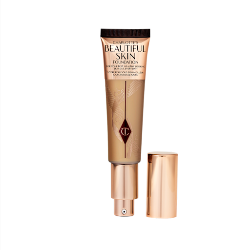 Beautiful Skin Foundation en 6N (Neutral/Neutre) ouvert Un fond de teint ouvert dans un emballage doré avec un distributeur à pompe et un flacon marron moyen pour montrer la teinte du fond de teint à l'intérieur.