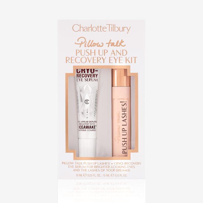 Pillow Talk Recovery Eye Kit packed A packed eye kit containing black mascara in a sheer pink-coloured tube with text on it that reads, 'Pillow Talk Push up lashes!' and a gold-coloured lid with an eye serum in a white-coloured tube.