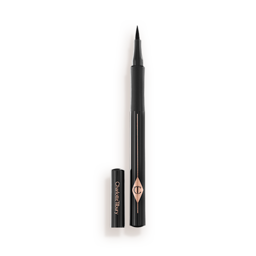 Feline Flick Eyeliner pen in Panther open An open eyeliner pen in jet-black packaging with the iconic CT logo embossed on it and its cap next to it.