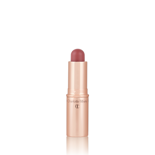 Quick & Easy Instant 5 Minute Sun-Kissed Look lip and cheek stick open An open, lip and cheek colour stick in a glowy soft pink shade in a golden-coloured tube.