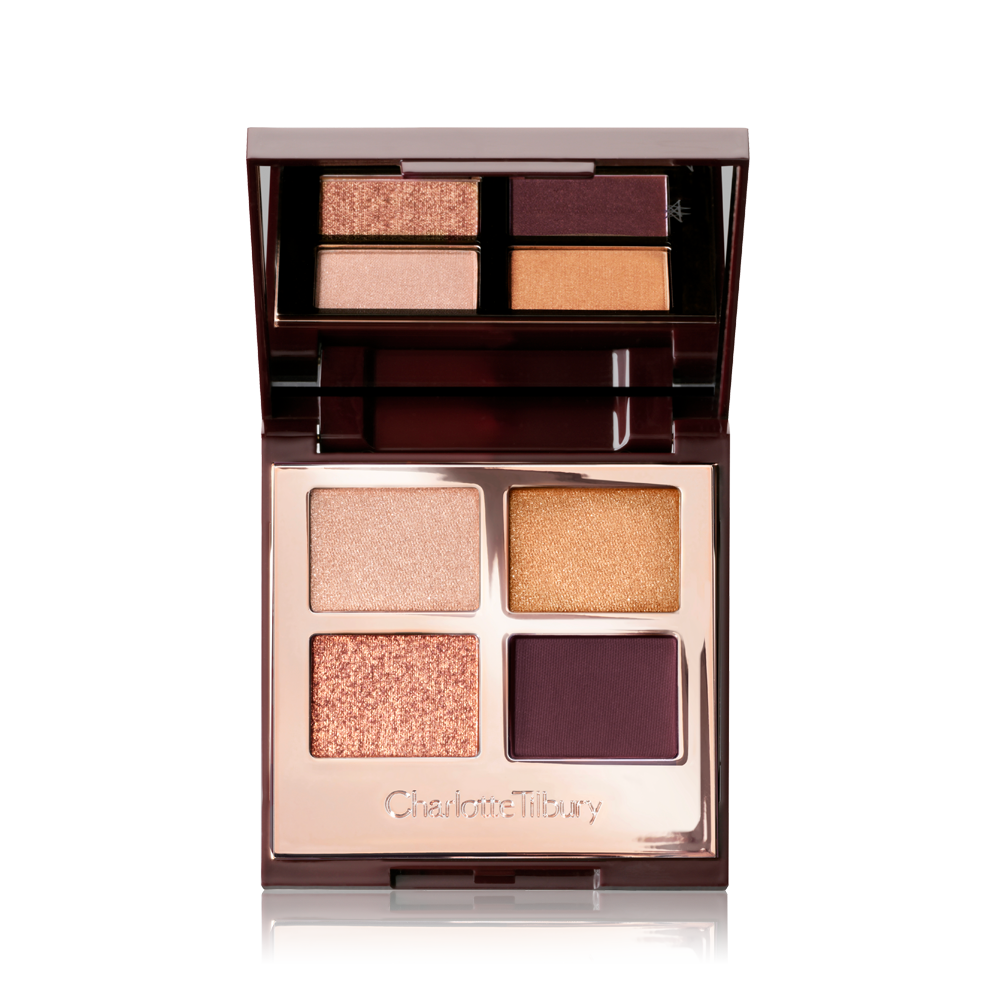 Luxury Palette The Queen Of Glow open An open, mirrored-lid quad eyeshadow palette with shimmery and matte rose gold, plum, and golden shades