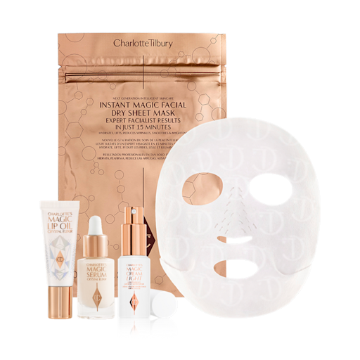 Hydrate Glow Summer Skin Secrets bundle displayed Lip oil in a white-coloured tube, travel-size luminous facial serum in a glass bottle with a dropper lid, travel-size face cream in a white bottle with a pump dispenser, and sheet mask in gold foil packaging.