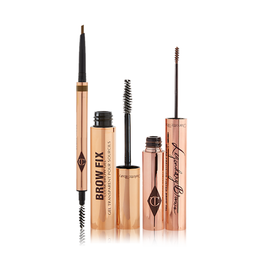 Fill, Feather and Fix Brow Bundle open An open, double-ended eyebrow pen and brush, open eyebrow gel, and open eyebrow tint, all in gold-coloured tubes.