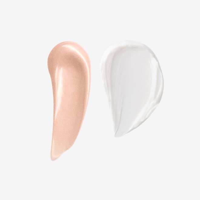 Skin Transformation Duo swatches Swatches of a glowy, rose-gold coloured primer and a pearly-white face cream.