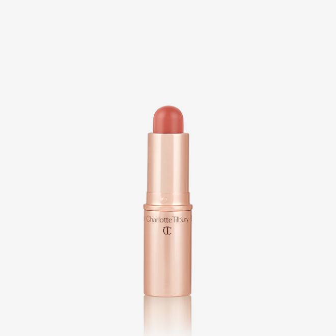 Quick & Easy Instant 5 Minute Golden Glow Look lip and cheek stick open An open, lip and cheek colour stick in a glowy nude rose shade in a golden-coloured tube.